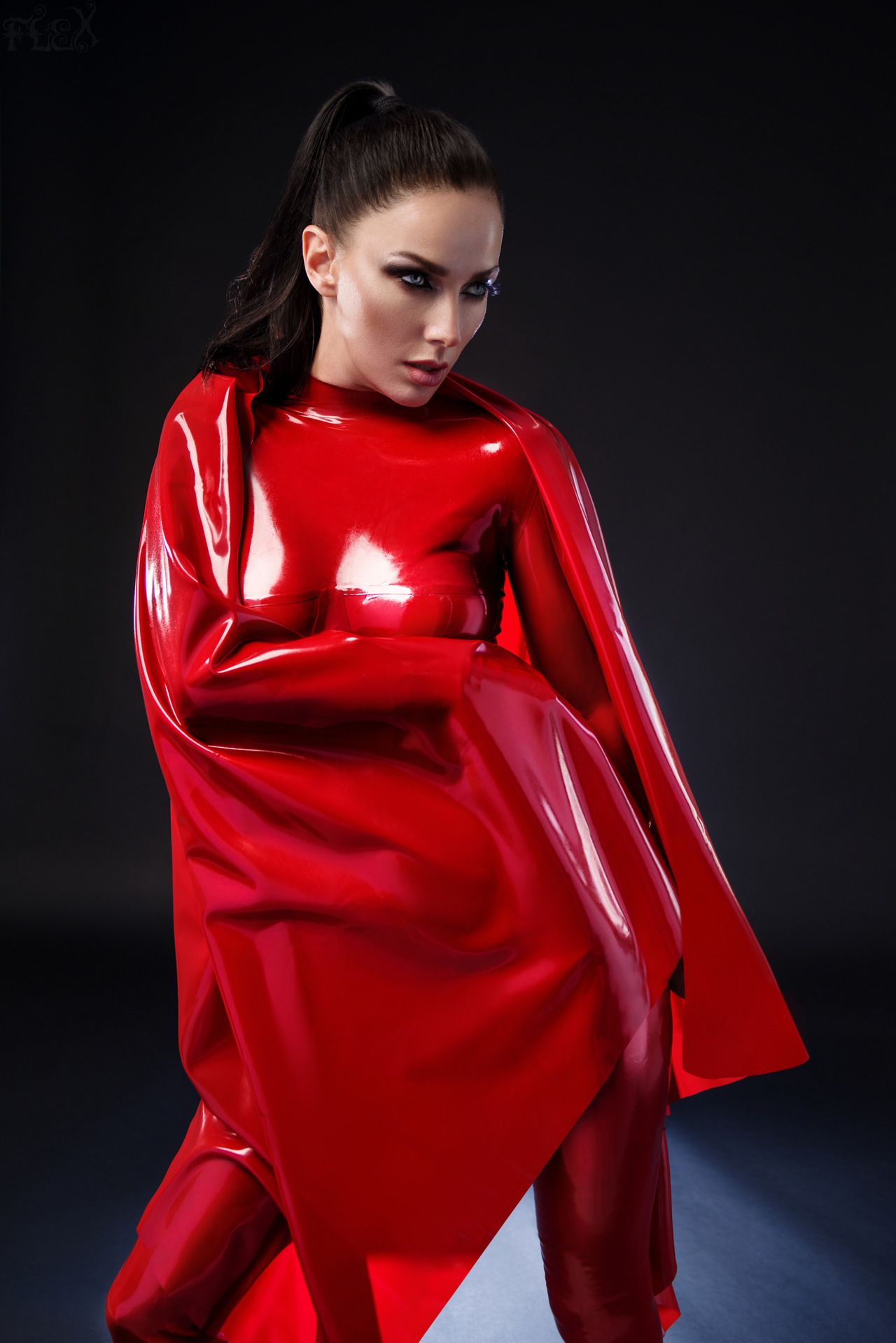 Red latex catsuit layers