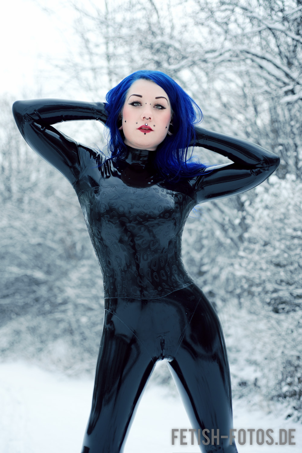 Latex catsuit in the snow